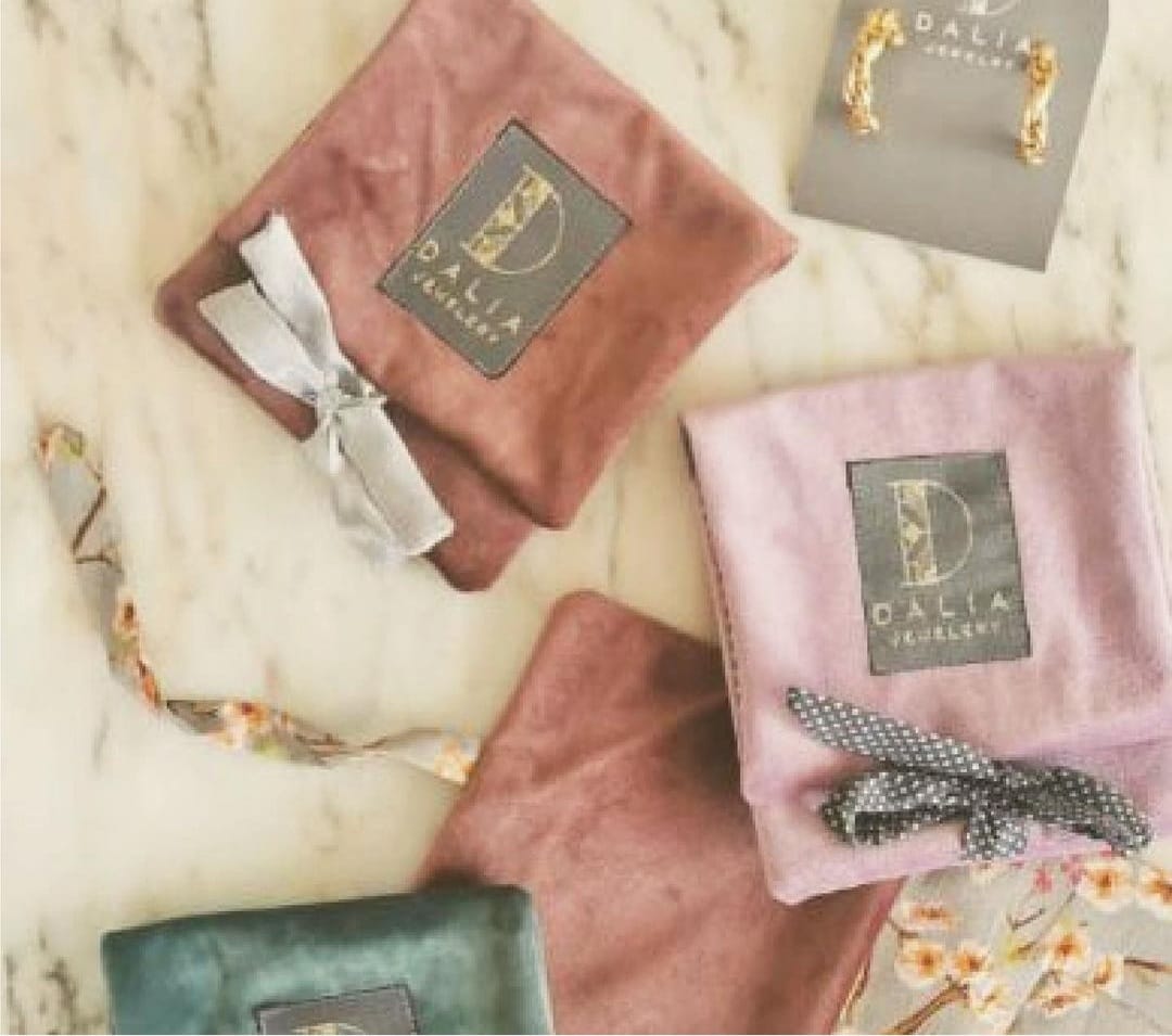 Branded velvet keepsake pouches sewn by Fabrica for a client